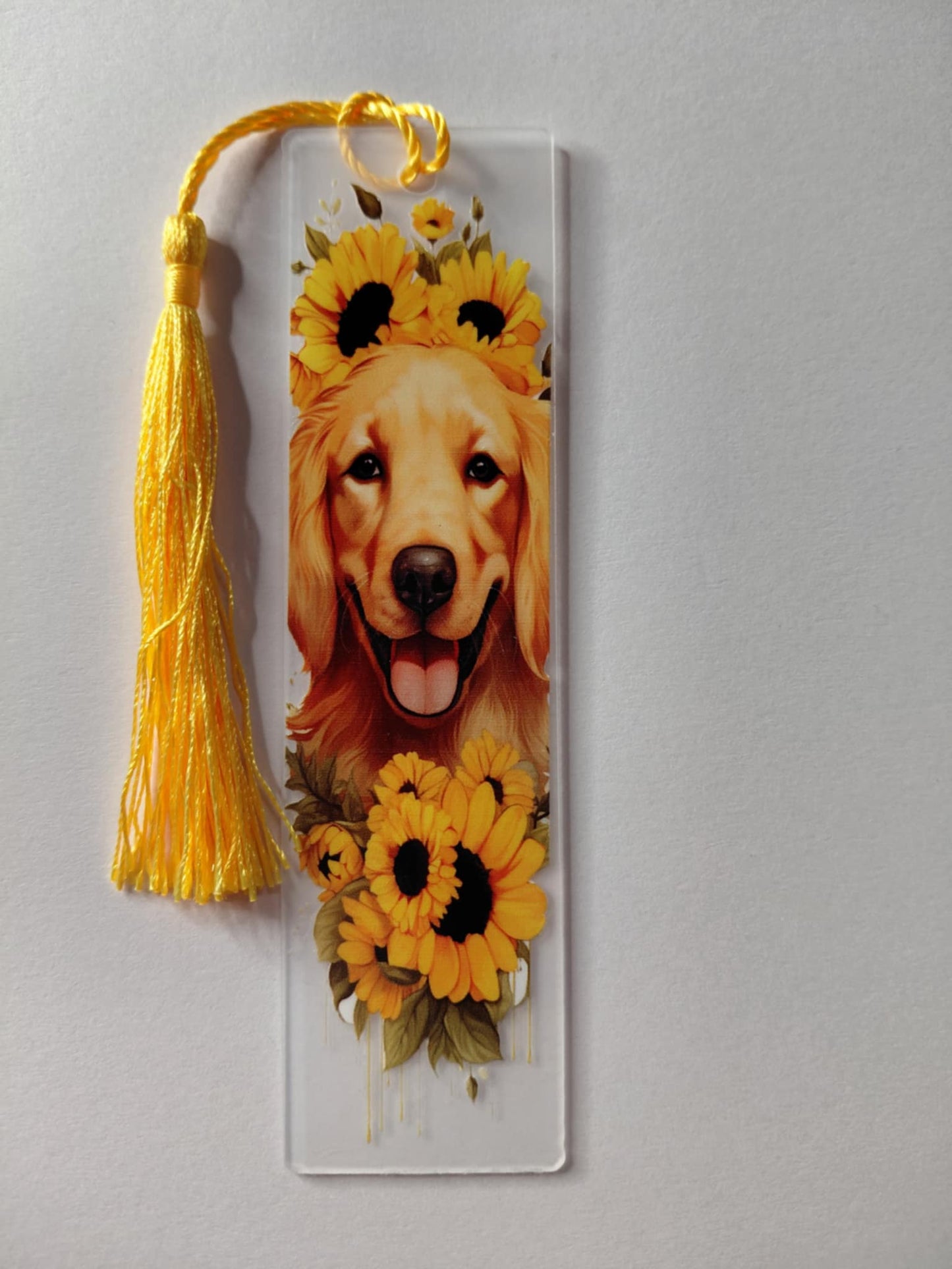 Marque pages avec une image de chien pompon jaune