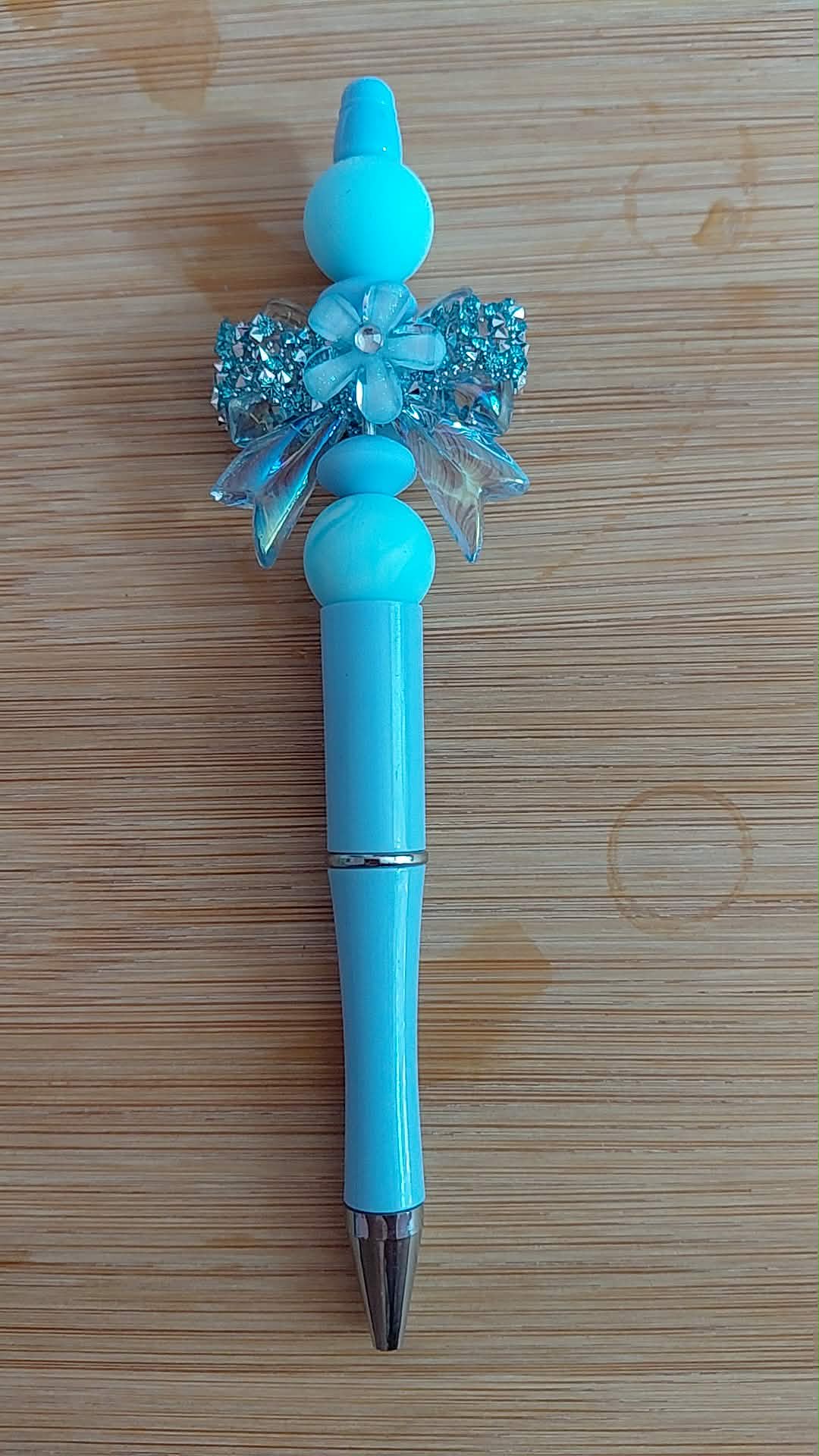 Stylo avec tête