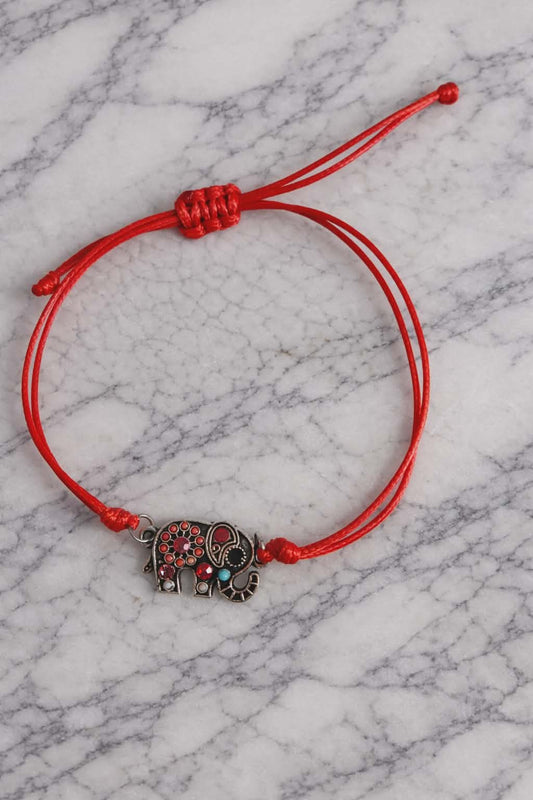 la corde et rouge l éléphants a des perle plusieurs couleur 