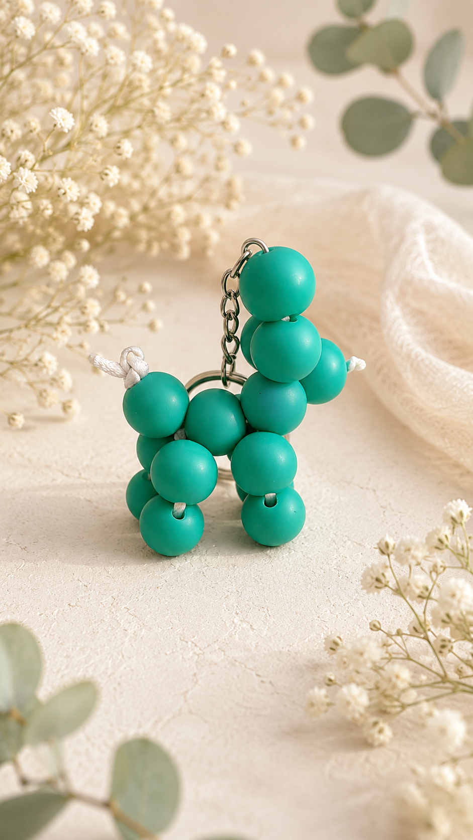 Porte clés chient en perles en silicone