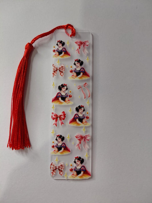 marque page avec image de nœud rouge et pompon rouge 