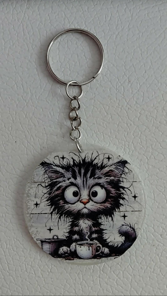 un porte clés avec un chat 