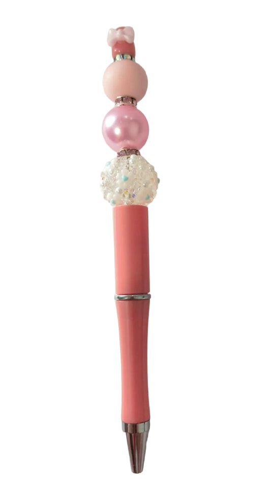 Stylo perles en silicone et en plastique rose avec des bijoux et un petit nœud 