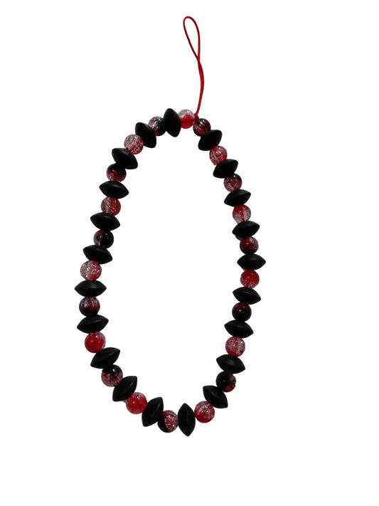 perles en verre rouge  aussi perles en silicone noire 