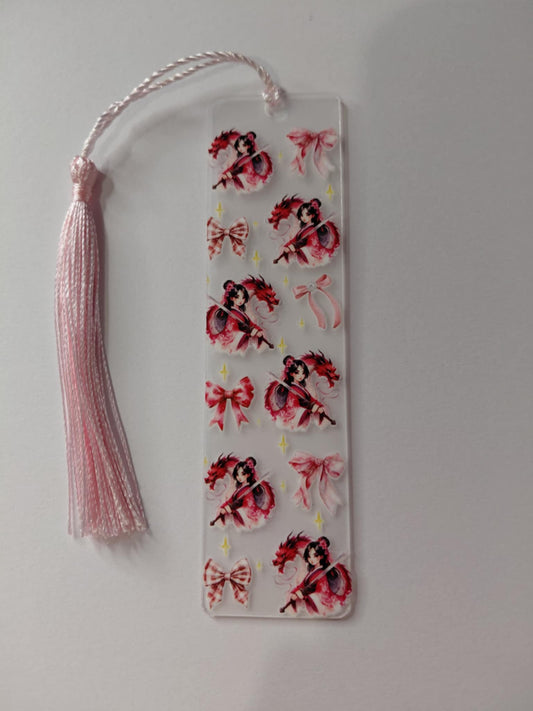 marque pages avec son pompon et des noeud